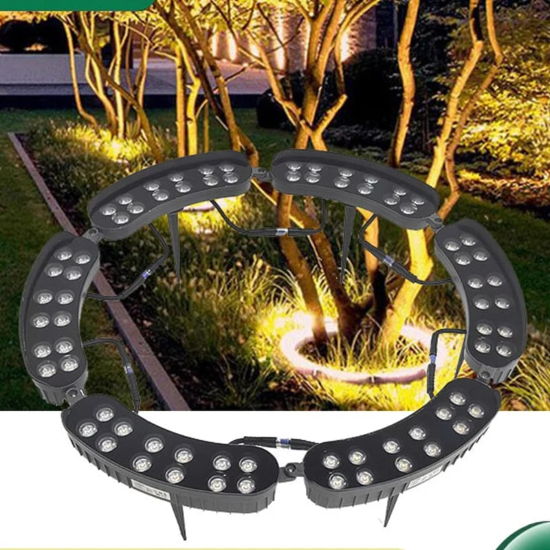 360 degree tree hugging LED landscape light illuminating an outdoor tree