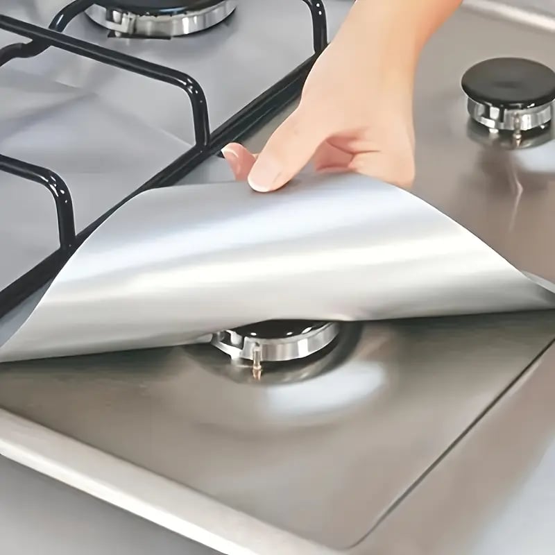 Flexible gas stove protector liner fitting around burner
