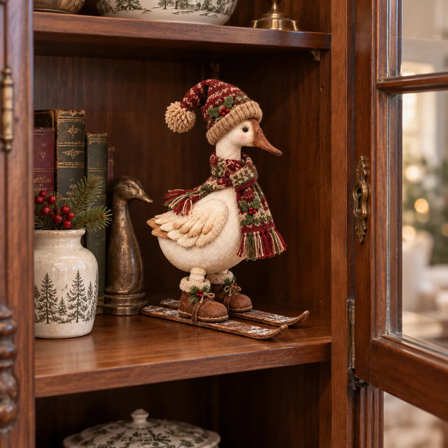 Christmas skiing goose on a bookshelf