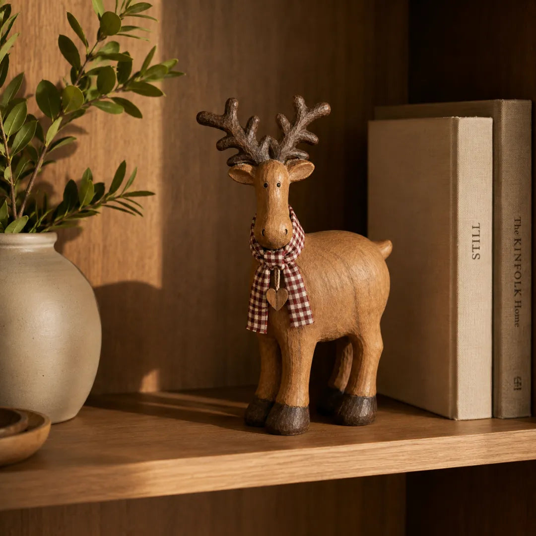 Rustic reindeer styled on farmhouse shelf