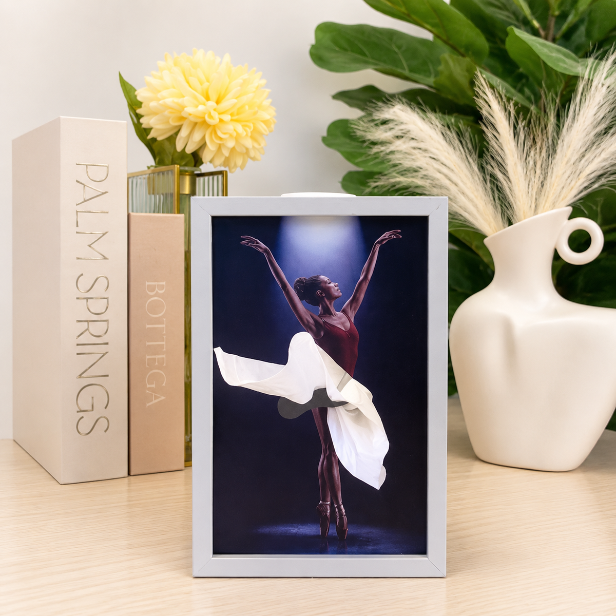 Ballerina tissue holder styled with books and flowers
