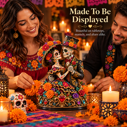 Eternal Love Catrina couple figurine displayed on a decorated table with adults