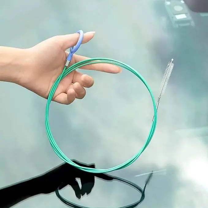 Flexible brush inserted into car drainage tube